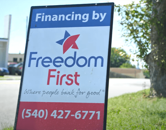 Yard sign that reads Financing by Freedom First